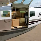 Maatskappy 4 beeld AIR CHARTER-DTL Zimbabwe in Johannesburg GP
