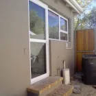 Maatskappy 2 beeld ALUCAPE ALUMINIUM Vistafold Stacker Doors in Cape Town WC